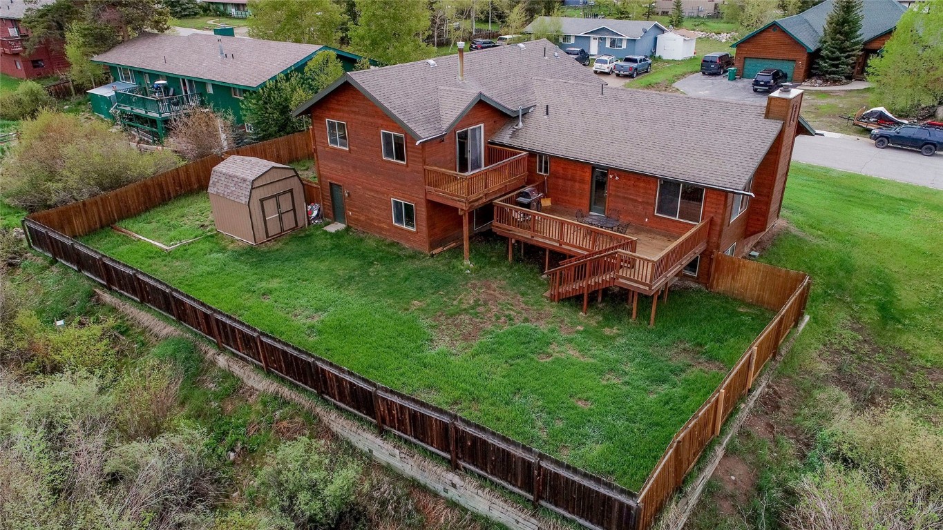 231 Alpine Road Dillon, CO 80435 - Photo 35 of 40 an aerial view of a house with a garden and trees