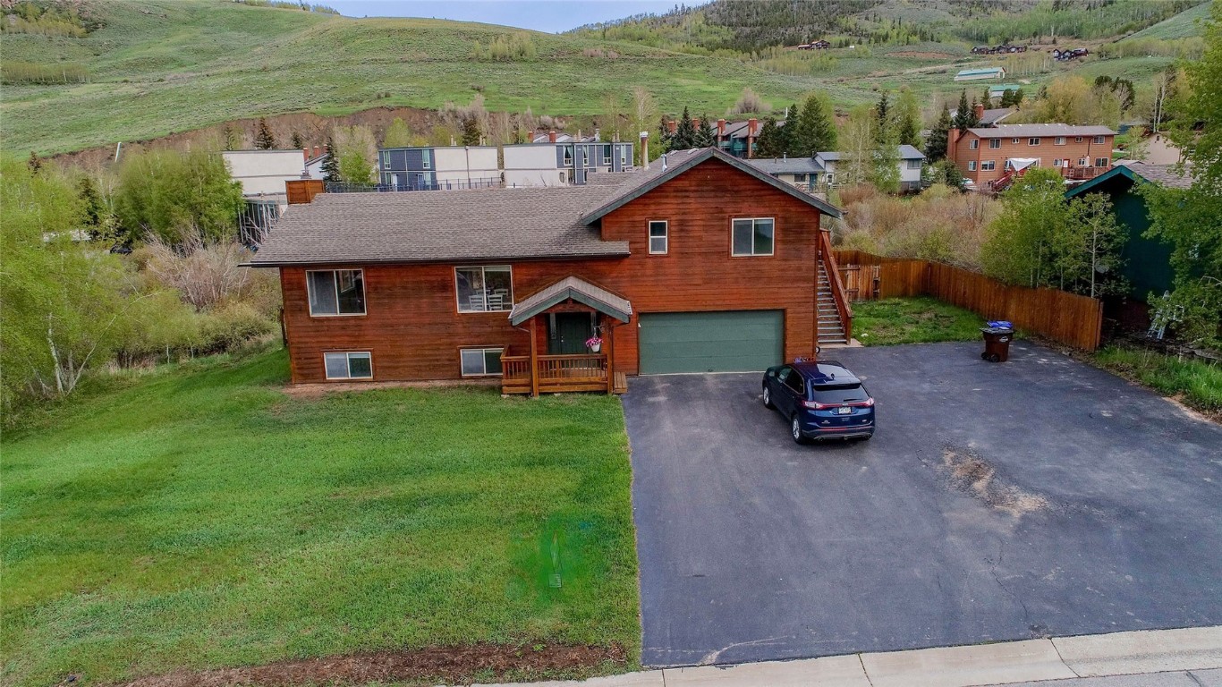 231 Alpine Road Dillon, CO 80435 - Photo 39 of 40 an aerial view of a house with garden space and lake view
