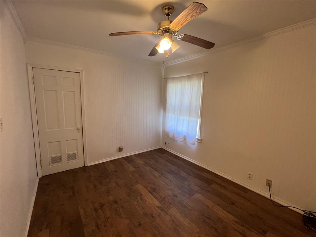 533 East Sears Street Denison, TX 75021 - Photo 16 of 27 wooden floor in an empty room