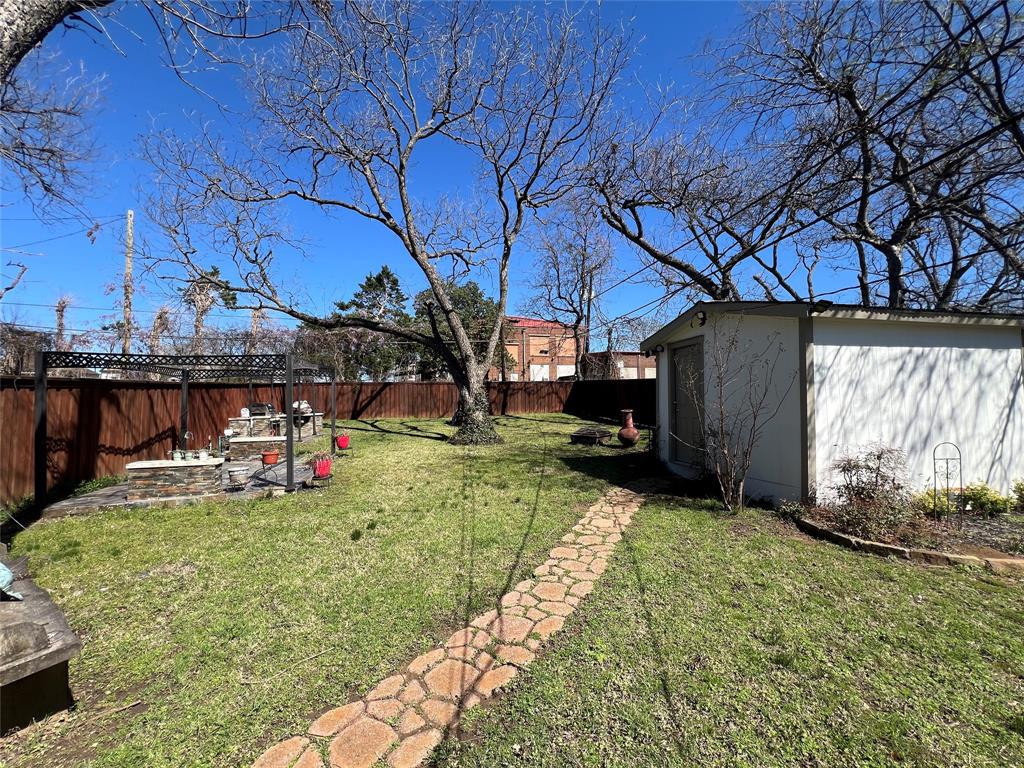 533 East Sears Street Denison, TX 75021 - Photo 27 of 27 a view of a backyard