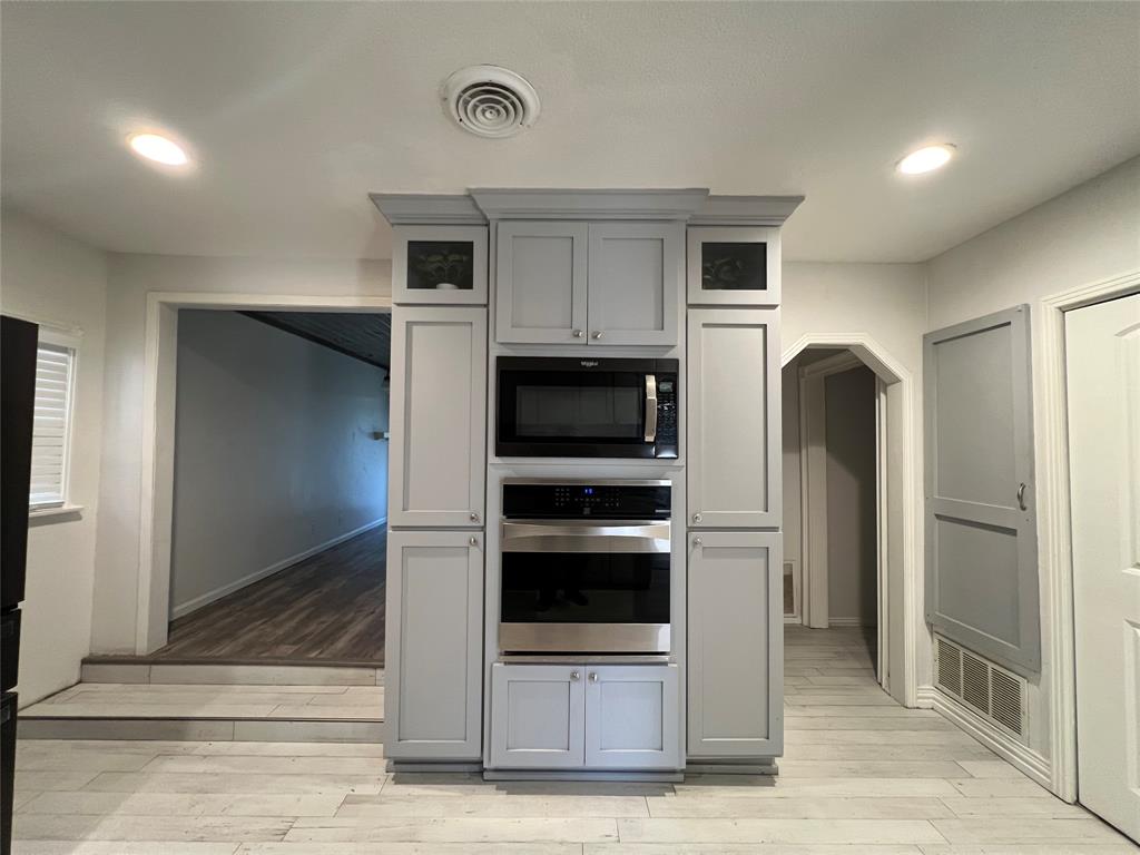 533 East Sears Street Denison, TX 75021 - Photo 9 of 27 a view of a livingroom with a fireplace