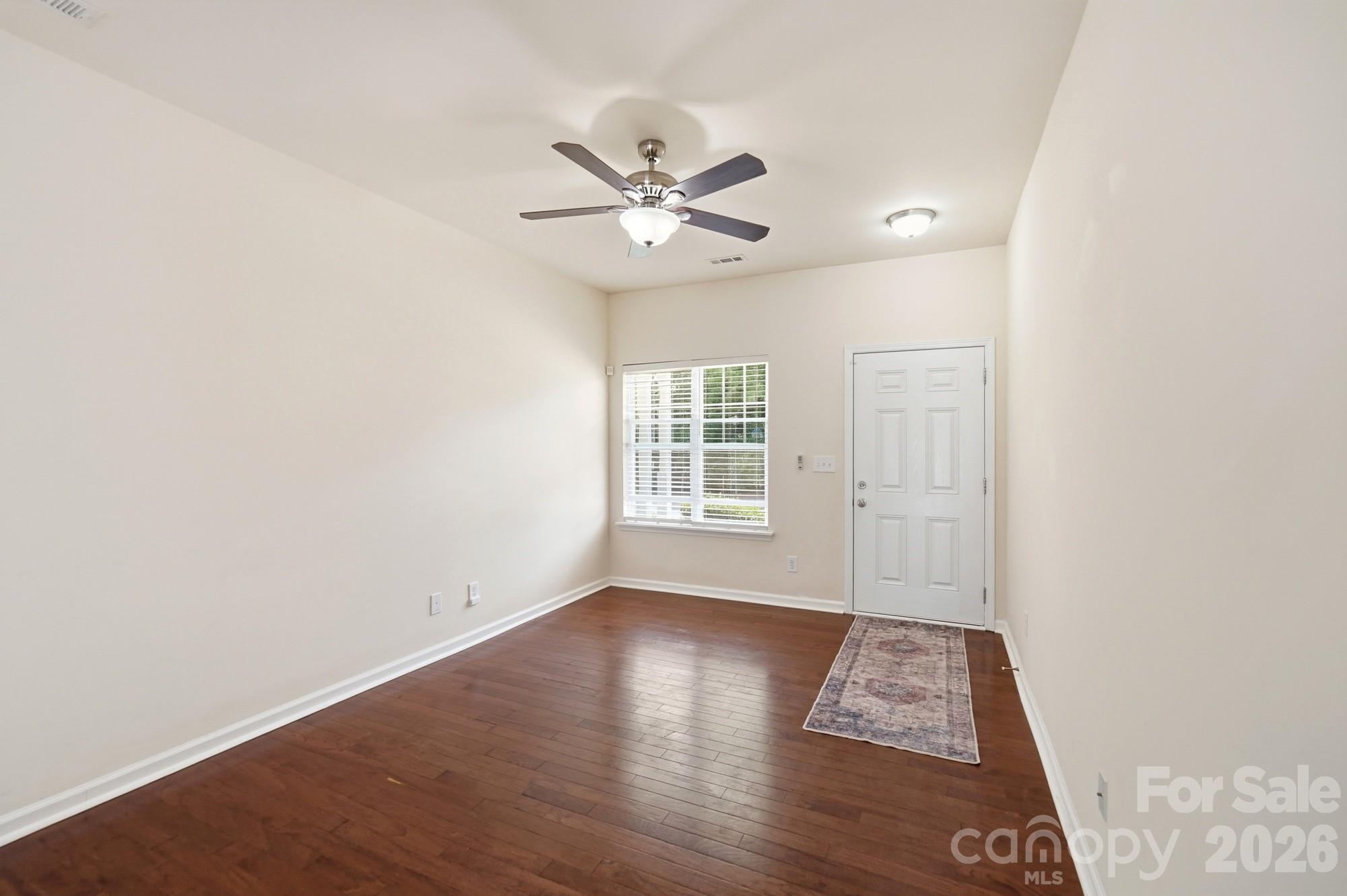 175 Limerick Road, Unit B Mooresville, NC 28115 - Photo 4 of 30 wooden floor in an empty room with a window