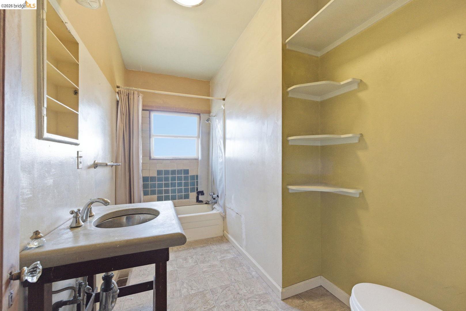 16129 Jacksonville Road Jamestown, CA 95327 - Photo 11 of 39 a bathroom with a sink toilet and shower