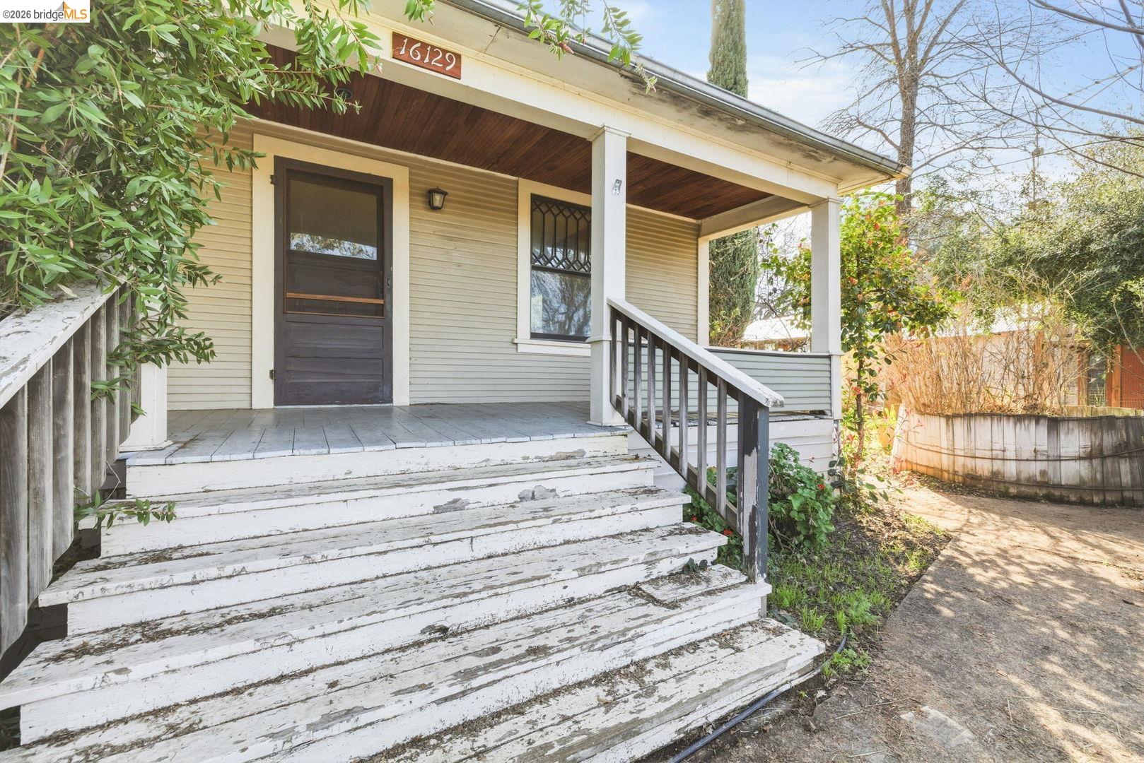 16129 Jacksonville Road Jamestown, CA 95327 - Photo 19 of 39 a view of entryway with wooden floor and fence