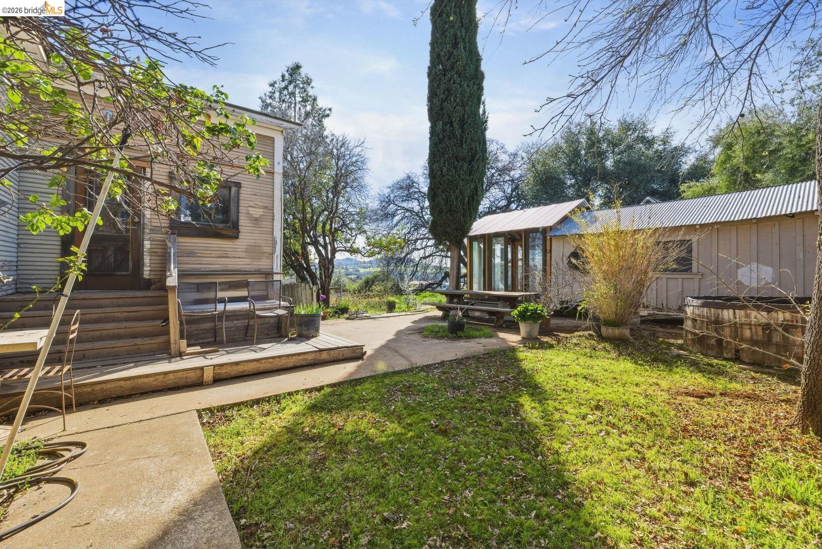 16129 Jacksonville Road Jamestown, CA 95327 - Photo 20 of 39 a view of a house with backyard and sitting area