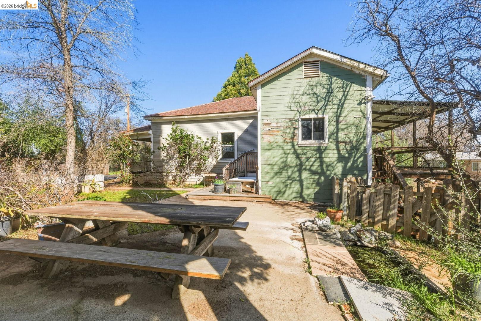 16129 Jacksonville Road Jamestown, CA 95327 - Photo 24 of 39 a view of a house with backyard and sitting area