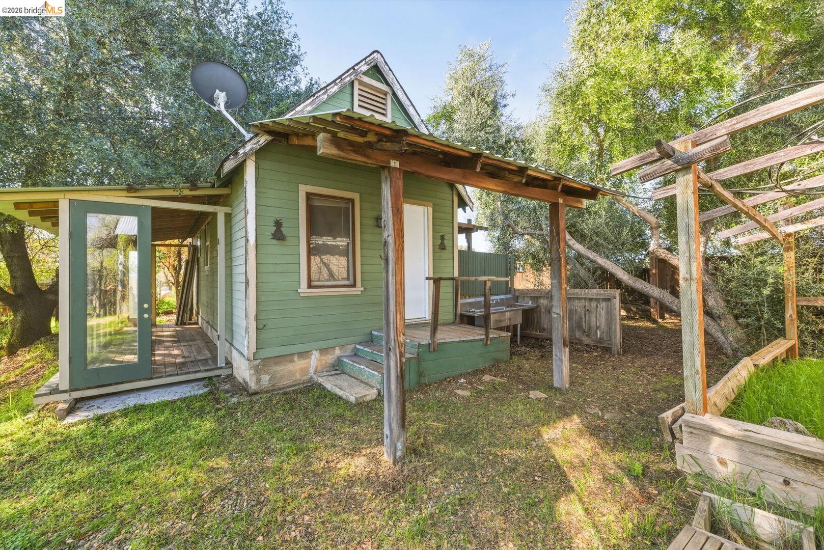 16129 Jacksonville Road Jamestown, CA 95327 - Photo 27 of 39 a view of a house with a yard