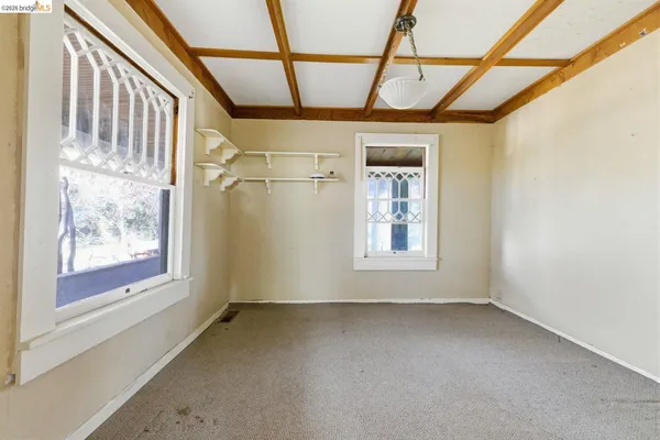 a view of a room with a window