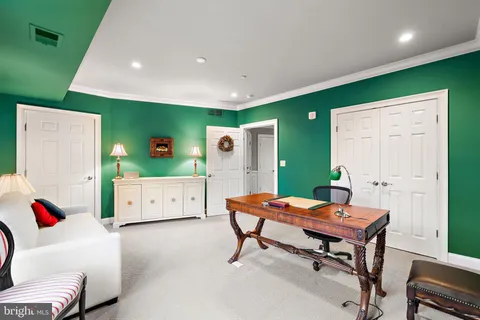 a workspace with furniture and window