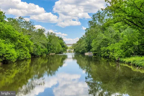 a view of a lake with a yard