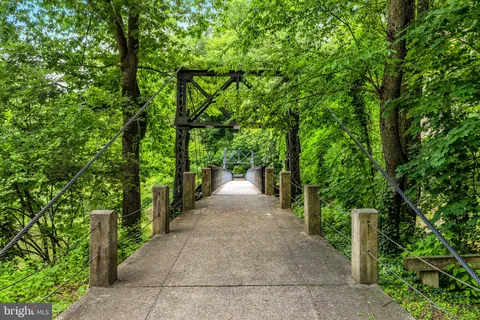 a view of backyard with green space