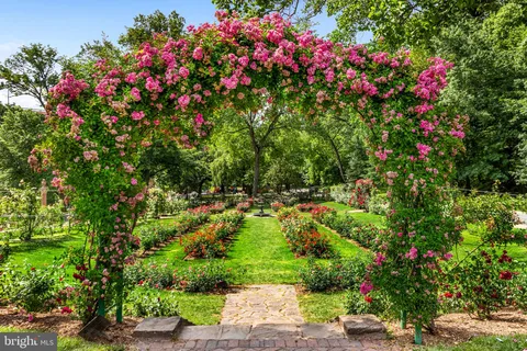 a front view of a building with lot of windows