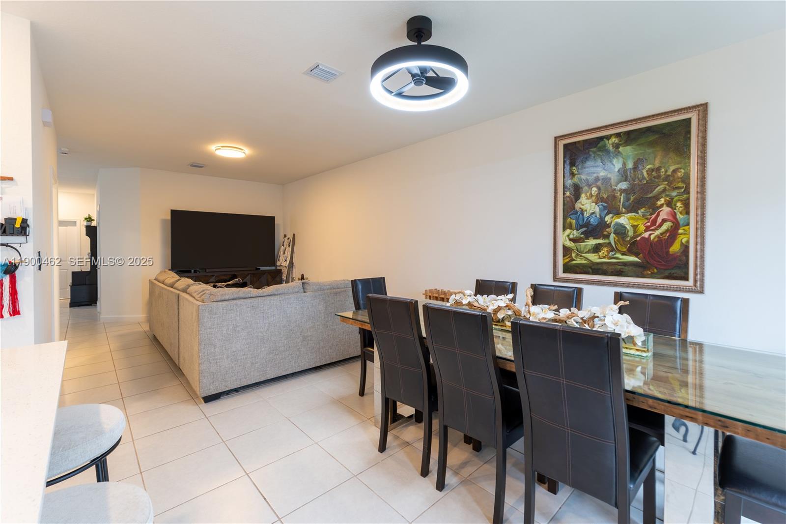 13132 Southwest 234th Terrace Homestead, FL 33032 - Photo 12 of 24 a view of a dining room with furniture
