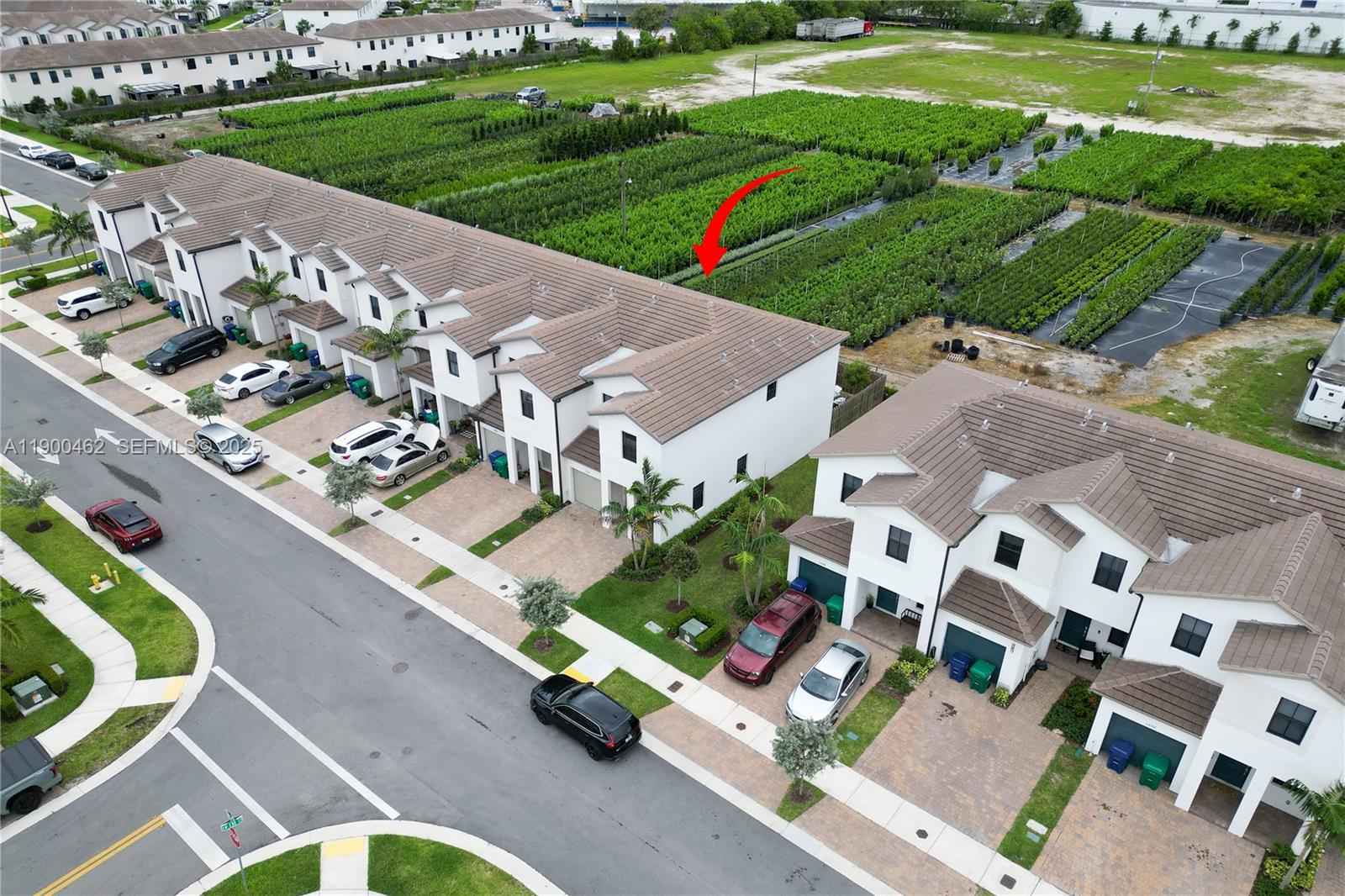 13132 Southwest 234th Terrace Homestead, FL 33032 - Photo 2 of 24 an aerial view of a house with a garden