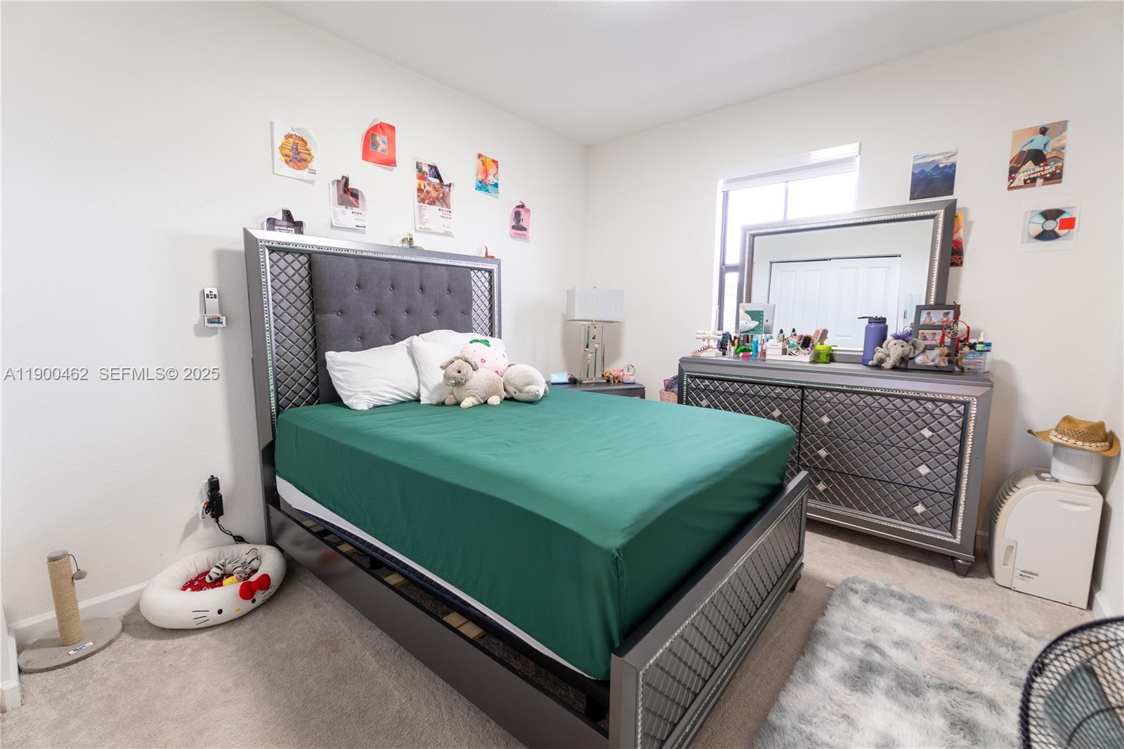 13132 Southwest 234th Terrace Homestead, FL 33032 - Photo 21 of 24 a bedroom with a bed and wooden floor