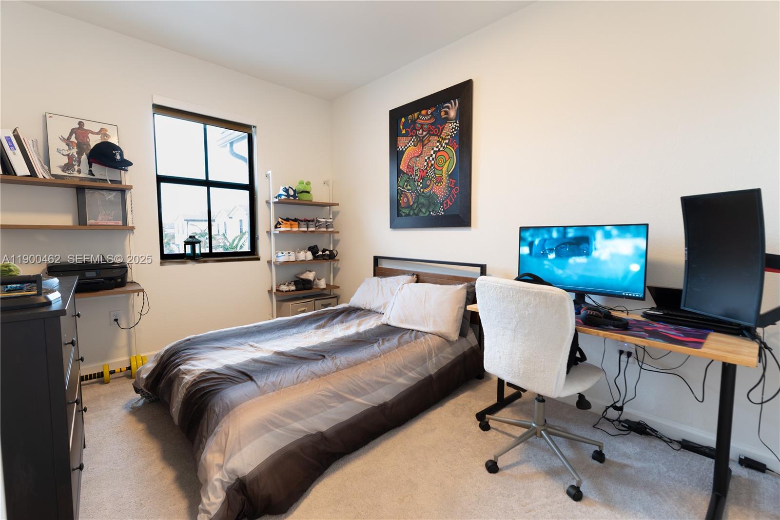 13132 Southwest 234th Terrace Homestead, FL 33032 - Photo 22 of 24 a bedroom with a workspace
