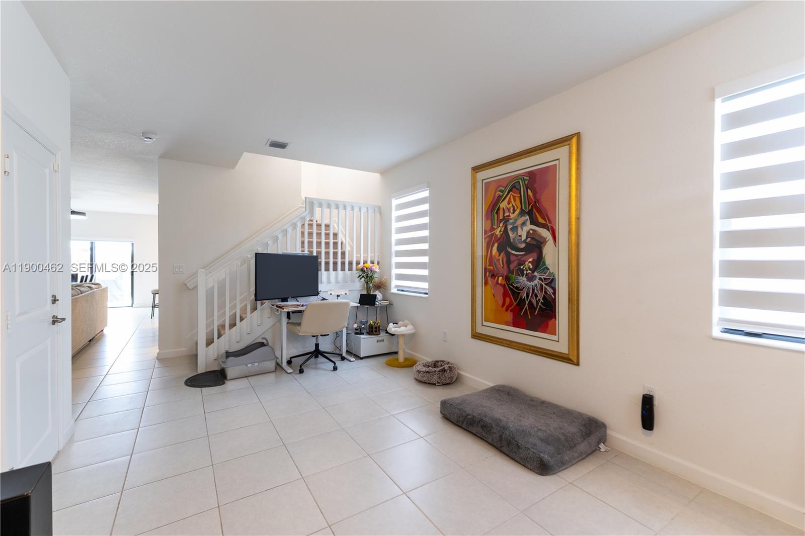 13132 Southwest 234th Terrace Homestead, FL 33032 - Photo 9 of 24 a living room with furniture and a window