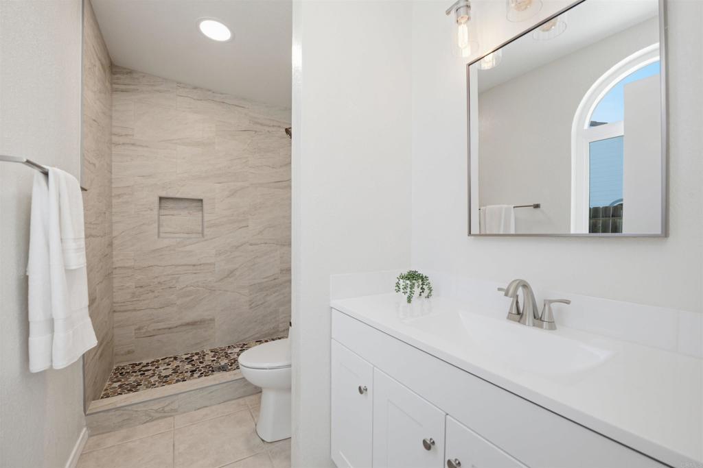 305 Via Metates Oceanside, CA 92057 - Photo 19 of 31 Primary bathroom with walk in shower
