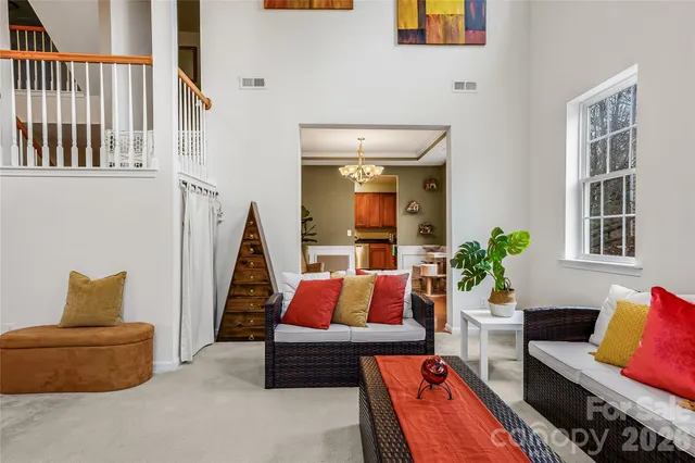 a living room with furniture and a couch