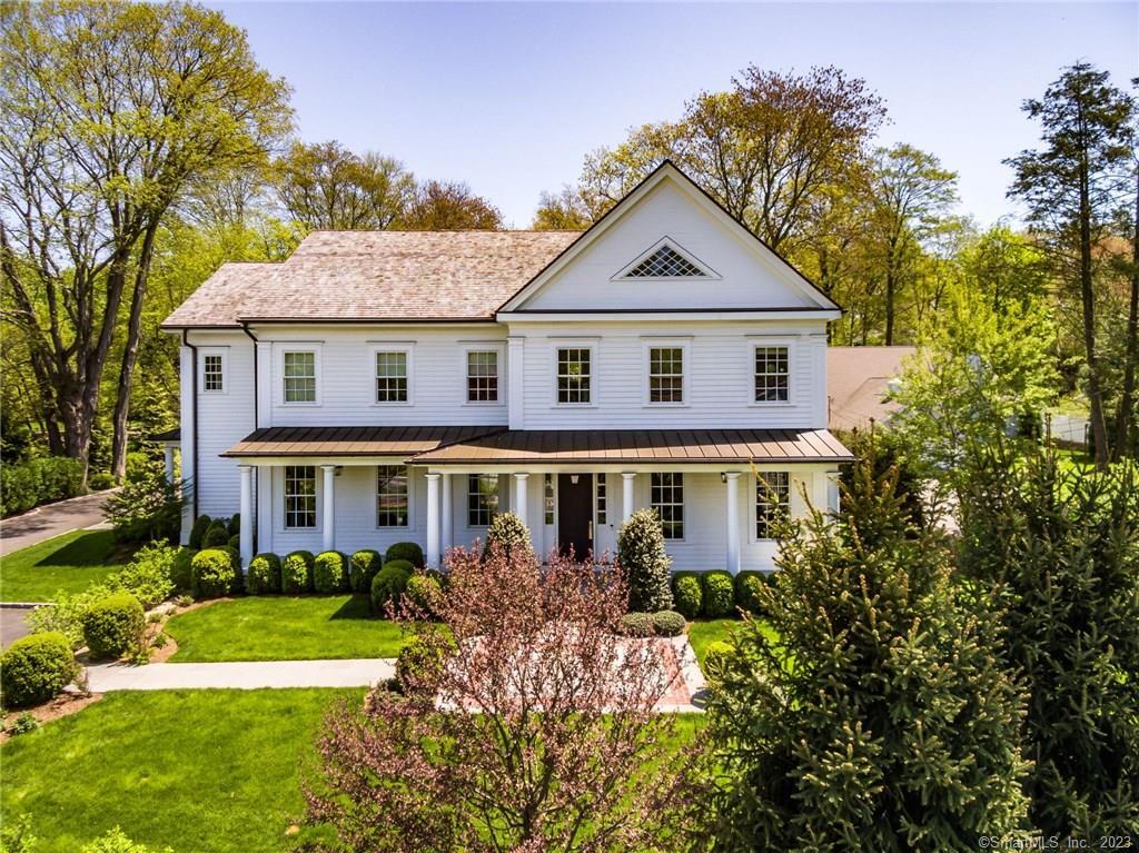 163 Compo Road South Westport, CT 06880 - Photo 1 of 1 front view of a house with a yard