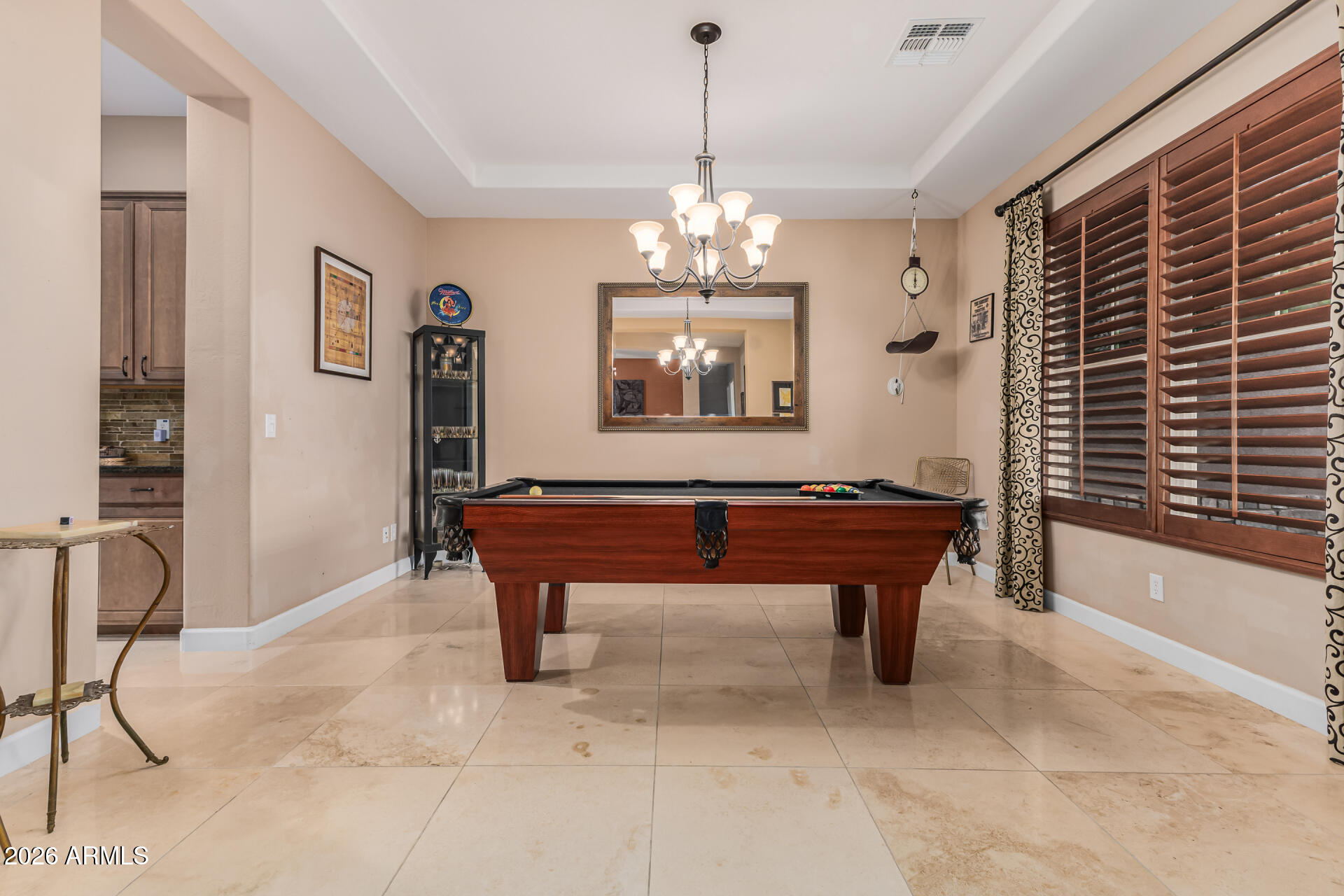 3139 East Harwell Road Phoenix, AZ 85042 - Photo 5 of 45 a room with pool table and windows