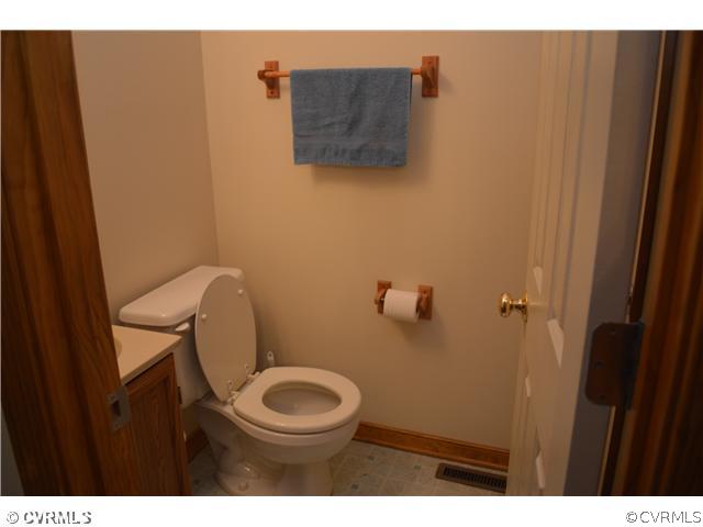 15713 Saddlebrook Road Chesterfield, VA 23838 - Photo 14 of 19 a bathroom with a toilet and a sink