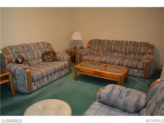 15713 Saddlebrook Road Chesterfield, VA 23838 - Photo 3 of 19 a living room with furniture and a couch
