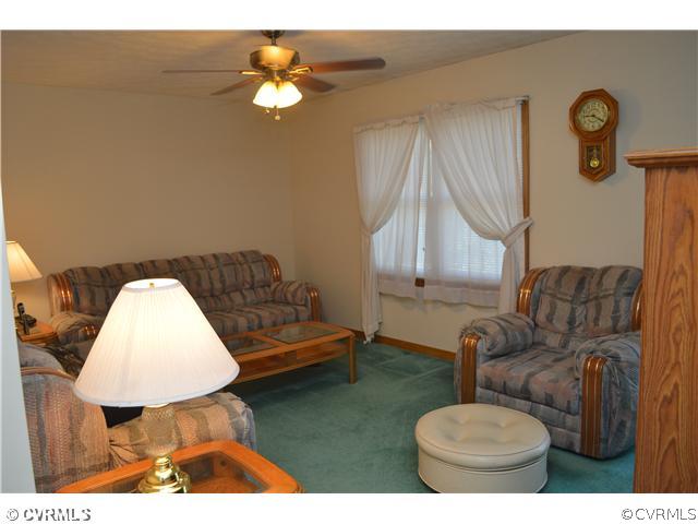 15713 Saddlebrook Road Chesterfield, VA 23838 - Photo 5 of 19 a living room with furniture and a wooden floor