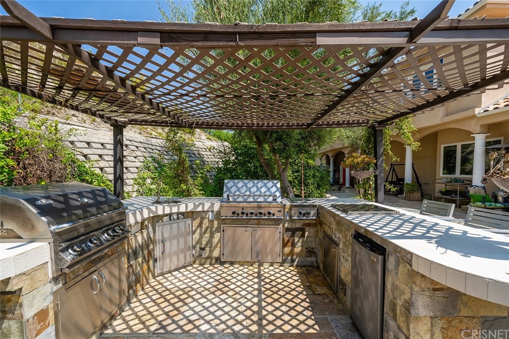 163 Dapplegray Road Bell Canyon, CA 91307 - Photo 7 of 7 a view of a porch with furniture and garden