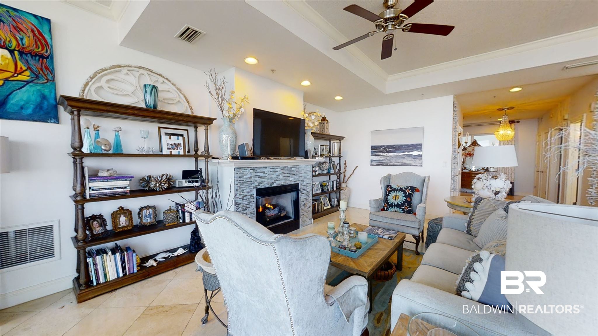 28250 Canal Road, Unit 705 Orange Beach, AL 36561 - Photo 4 of 49 Living Room: Natural Gas Fireplace w Tile Surround