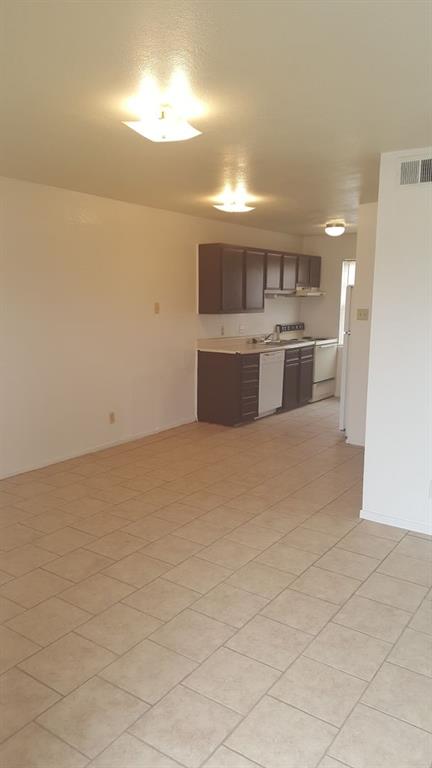 701 South Cherry Street, Unit D Merkel, TX 79536 - Photo 2 of 6 a view of a kitchen with a sink