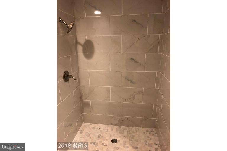 3601 Rusty Rock Road Randallstown, MD 21133 - Photo 14 of 20 a bathroom with a shower