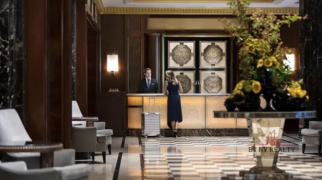 a room with lots of chairs and a table