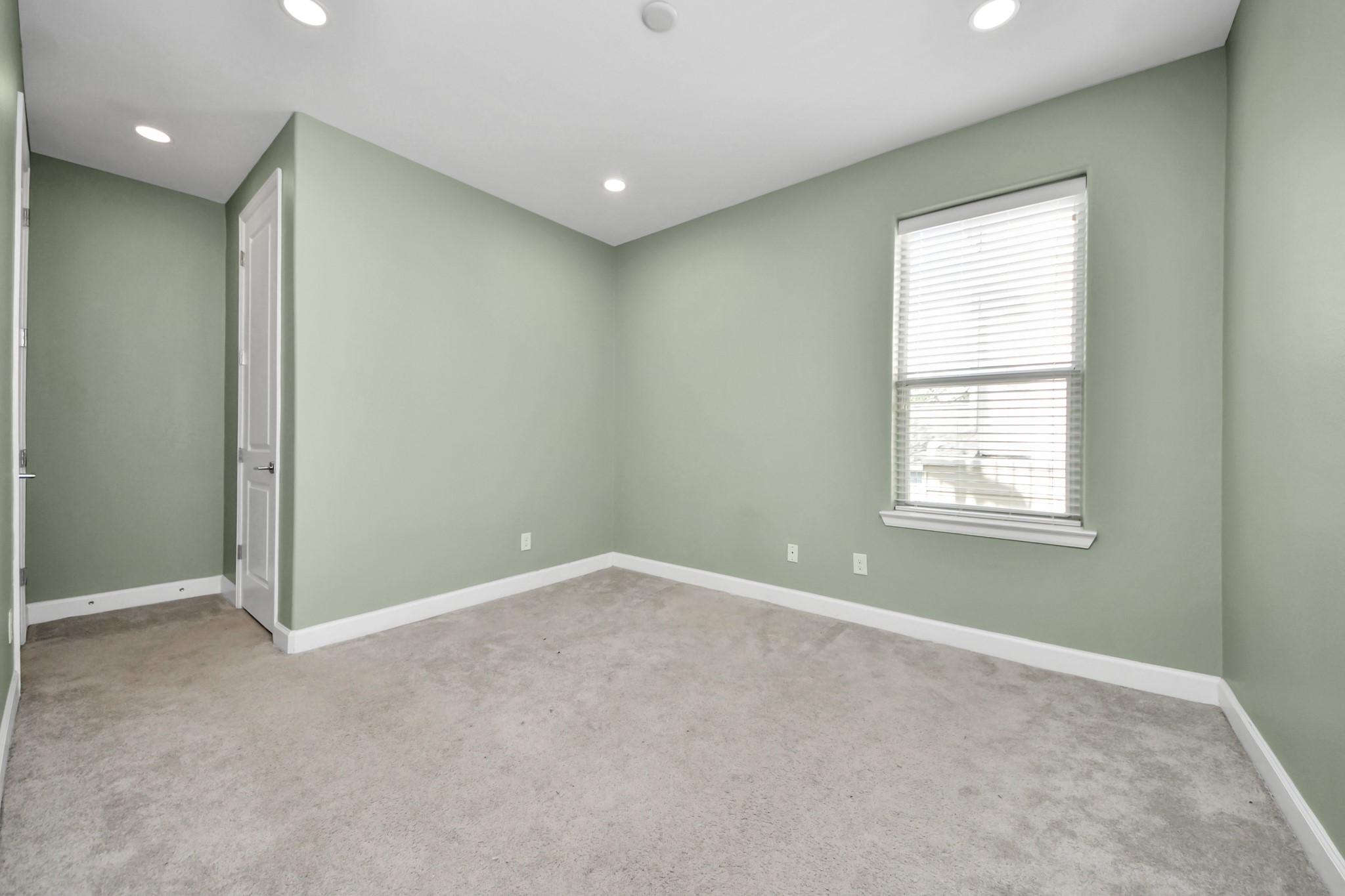 1716 Stuart Street Houston, TX 77004 - Photo 32 of 39 a view of an empty room with a window