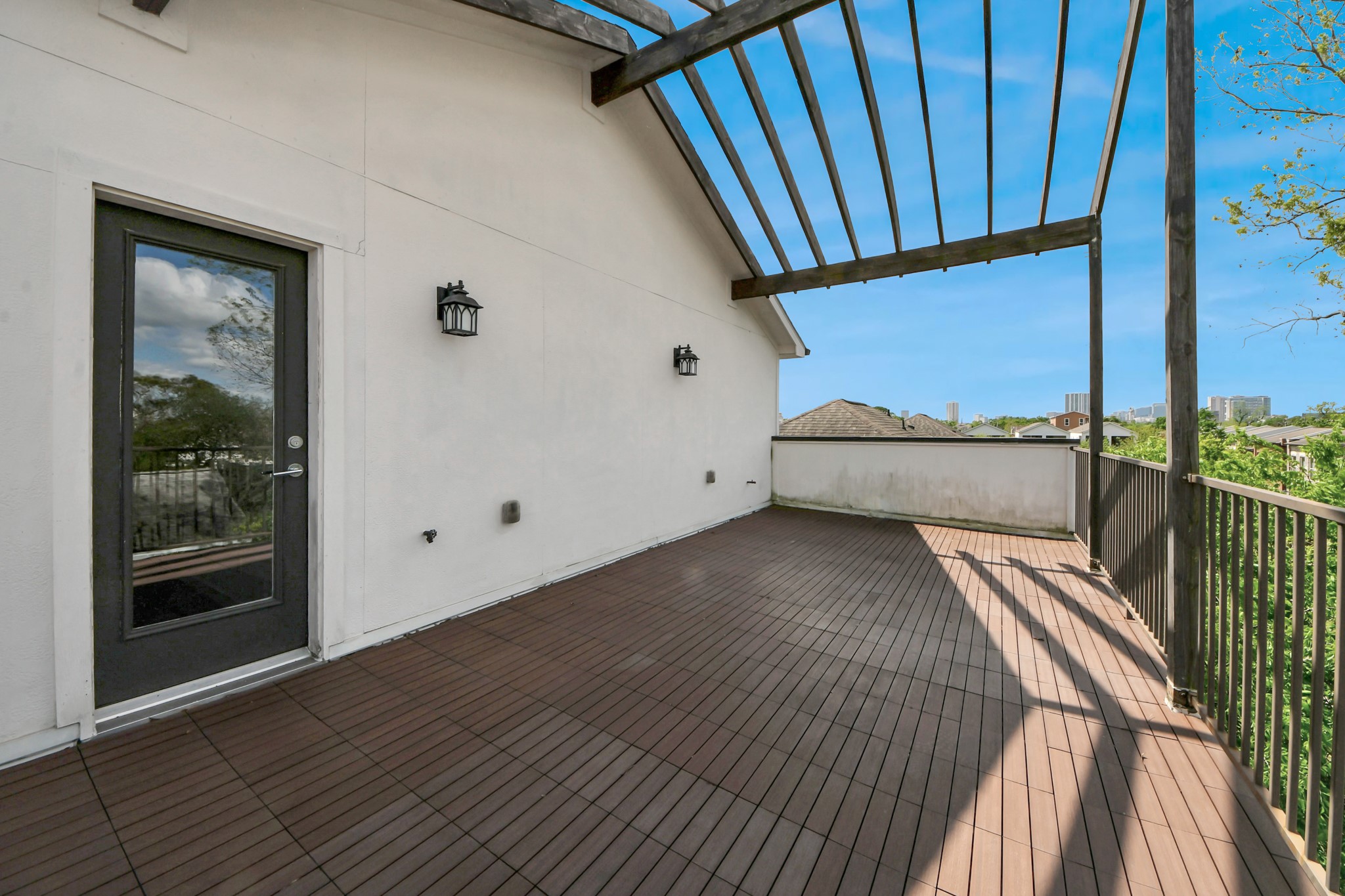 1716 Stuart Street Houston, TX 77004 - Photo 36 of 39 a view of balcony with floor to ceiling window
