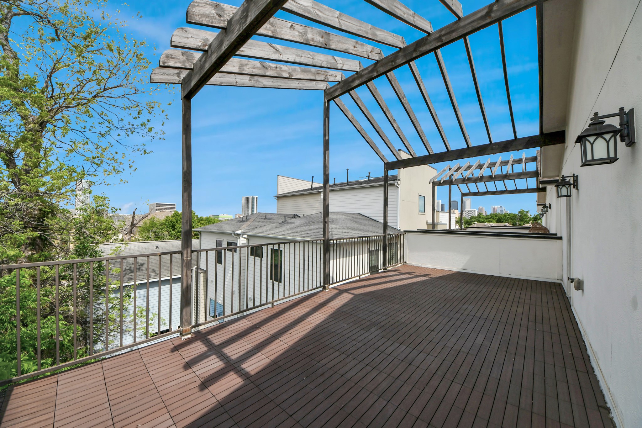 1716 Stuart Street Houston, TX 77004 - Photo 37 of 39 a view of balcony with wooden floor