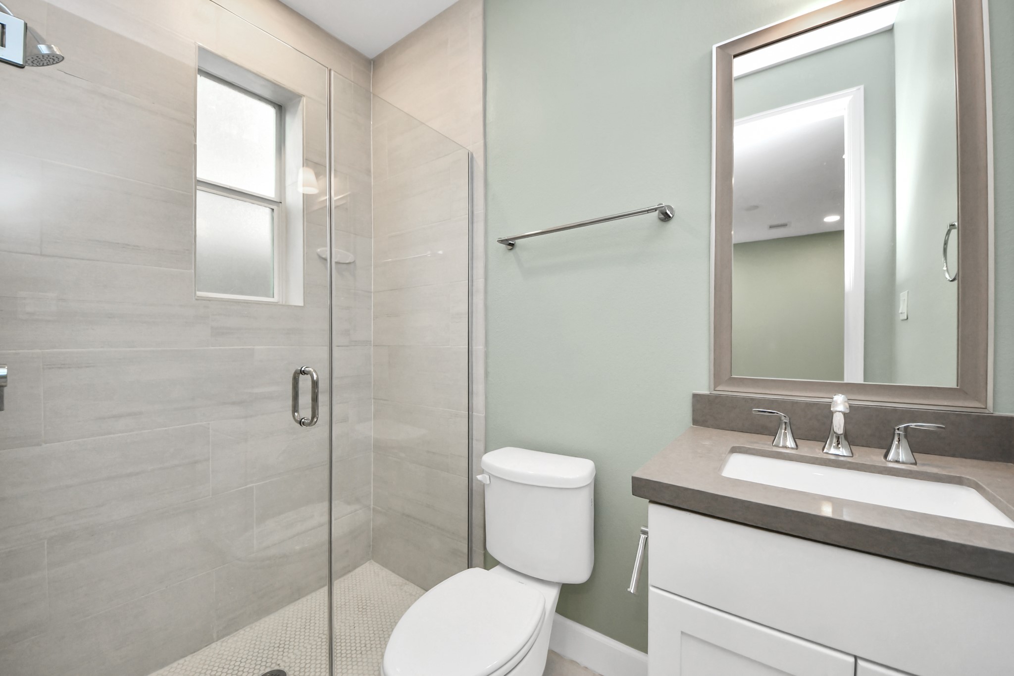 1716 Stuart Street Houston, TX 77004 - Photo 8 of 39 a bathroom with a granite countertop sink toilet and shower