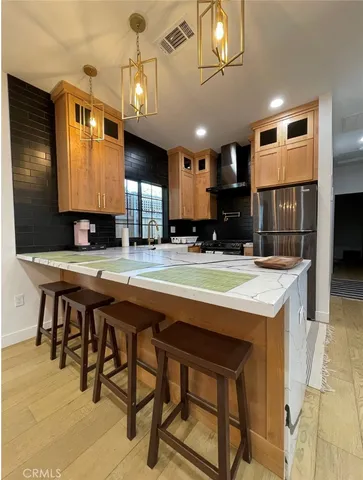 a swimming pool with outdoor seating