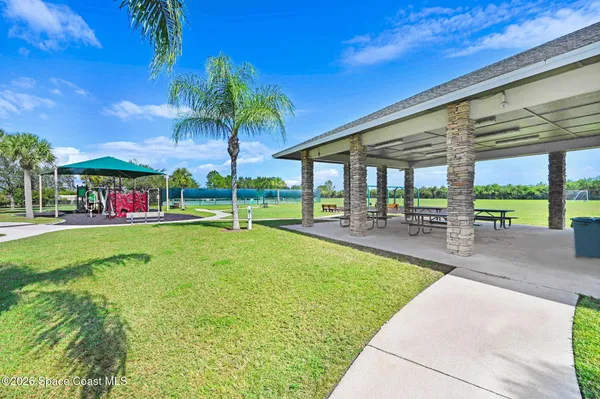 a view of a lake and a yard
