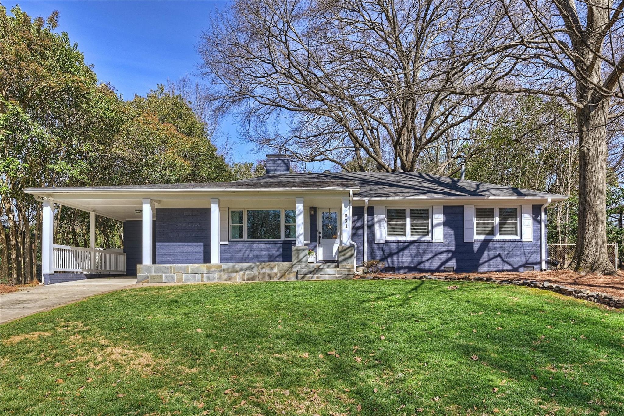 631 Seneca Place Charlotte, NC 28210 - Photo 1 of 21 front view of a house with a yard