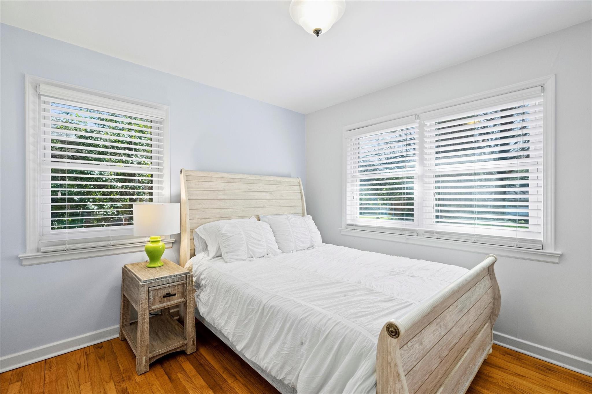 631 Seneca Place Charlotte, NC 28210 - Photo 13 of 21 a bedroom with a bed and a window