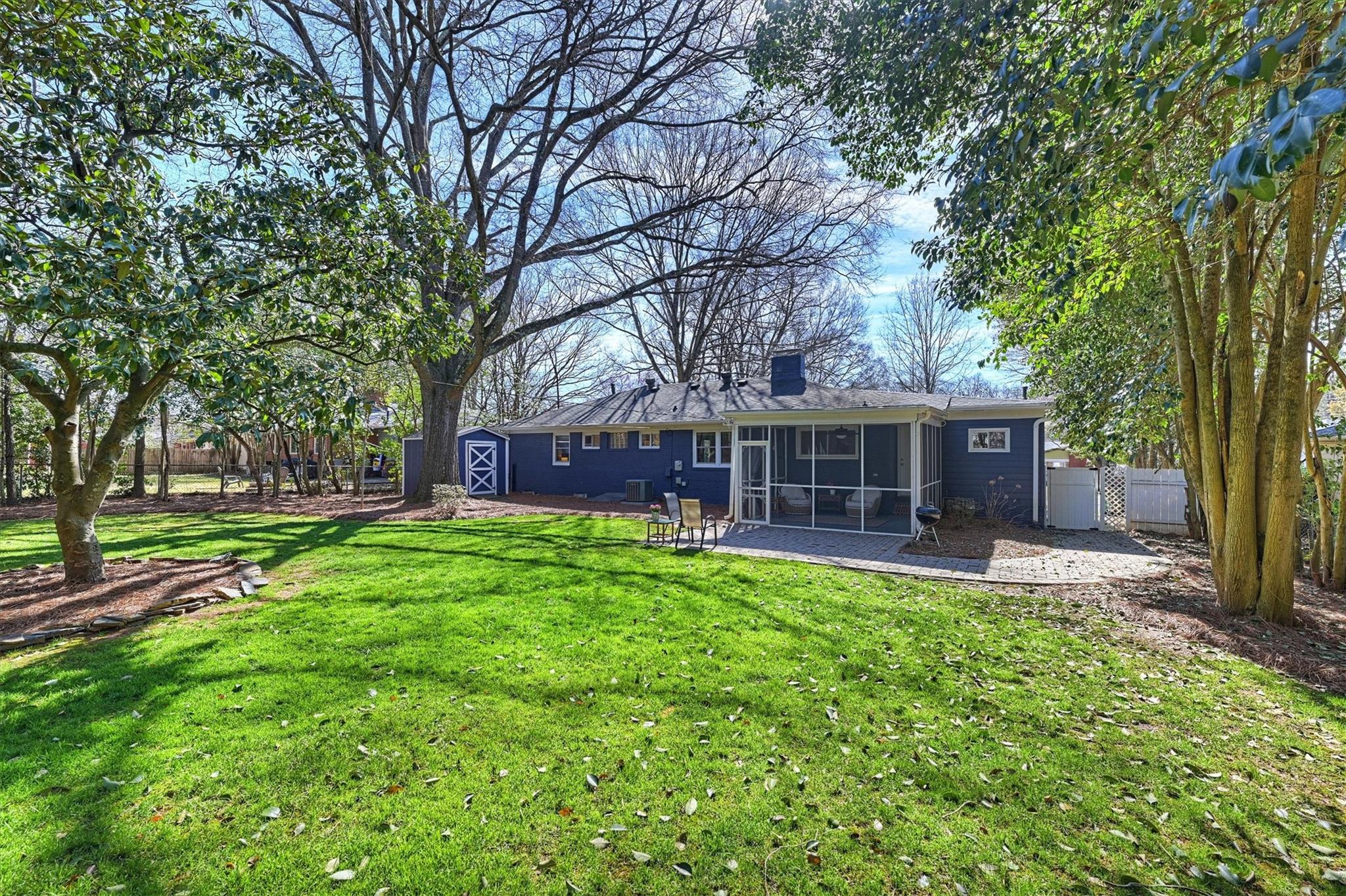 631 Seneca Place Charlotte, NC 28210 - Photo 20 of 21 a view of a house with a yard