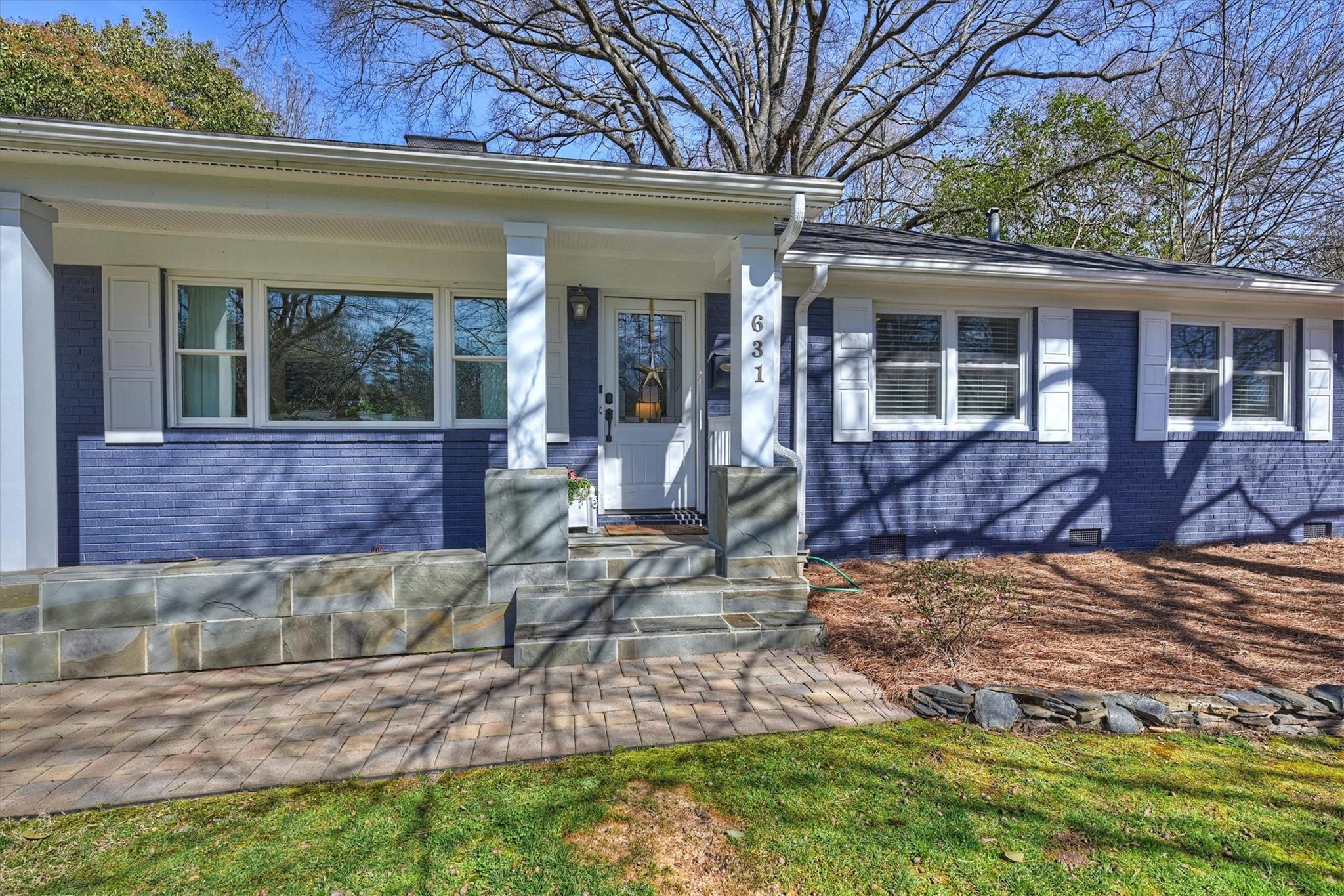 631 Seneca Place Charlotte, NC 28210 - Photo 2 of 21 a view of a house with a yard