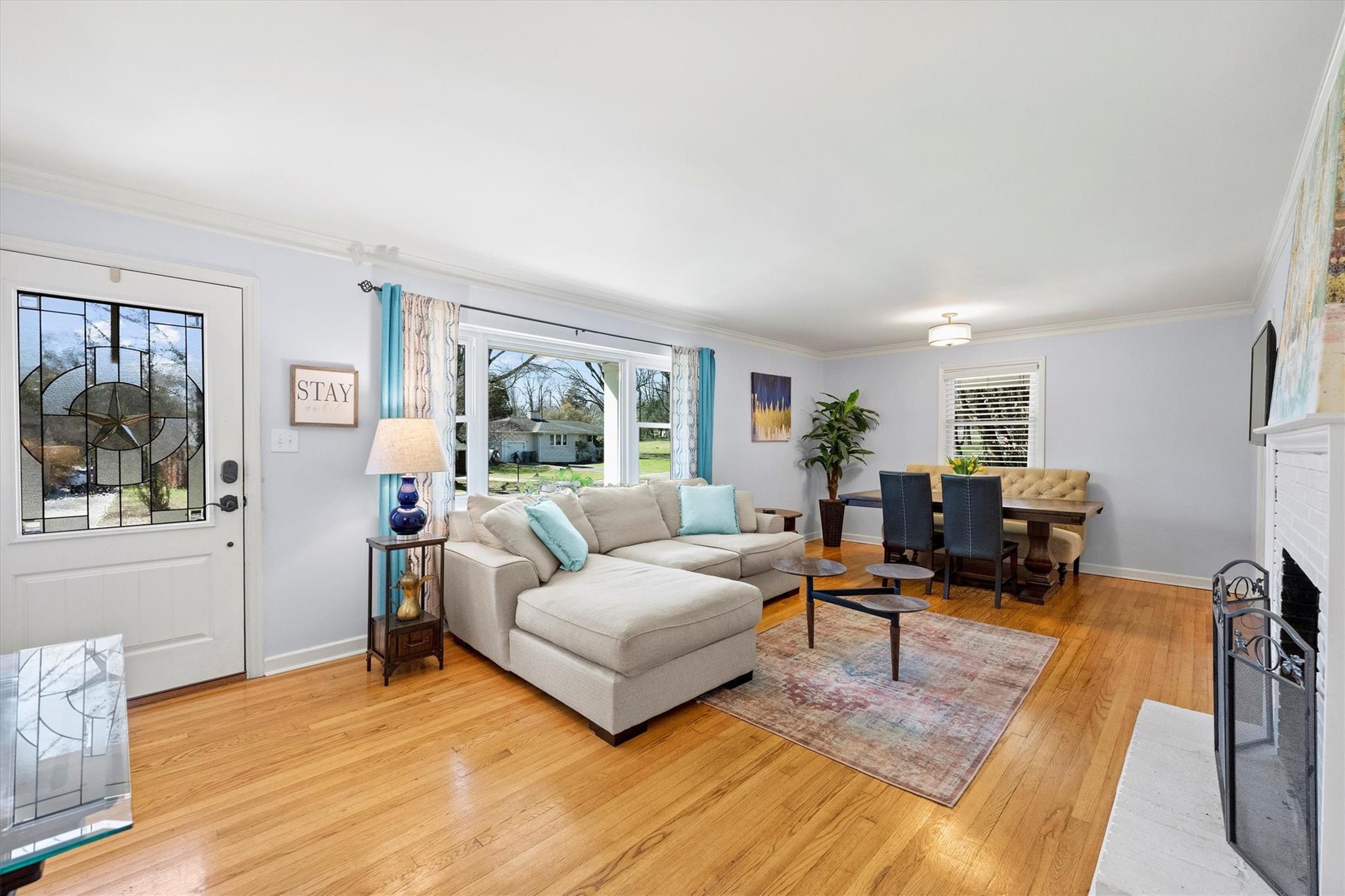 631 Seneca Place Charlotte, NC 28210 - Photo 3 of 21 a living room with furniture and a large window