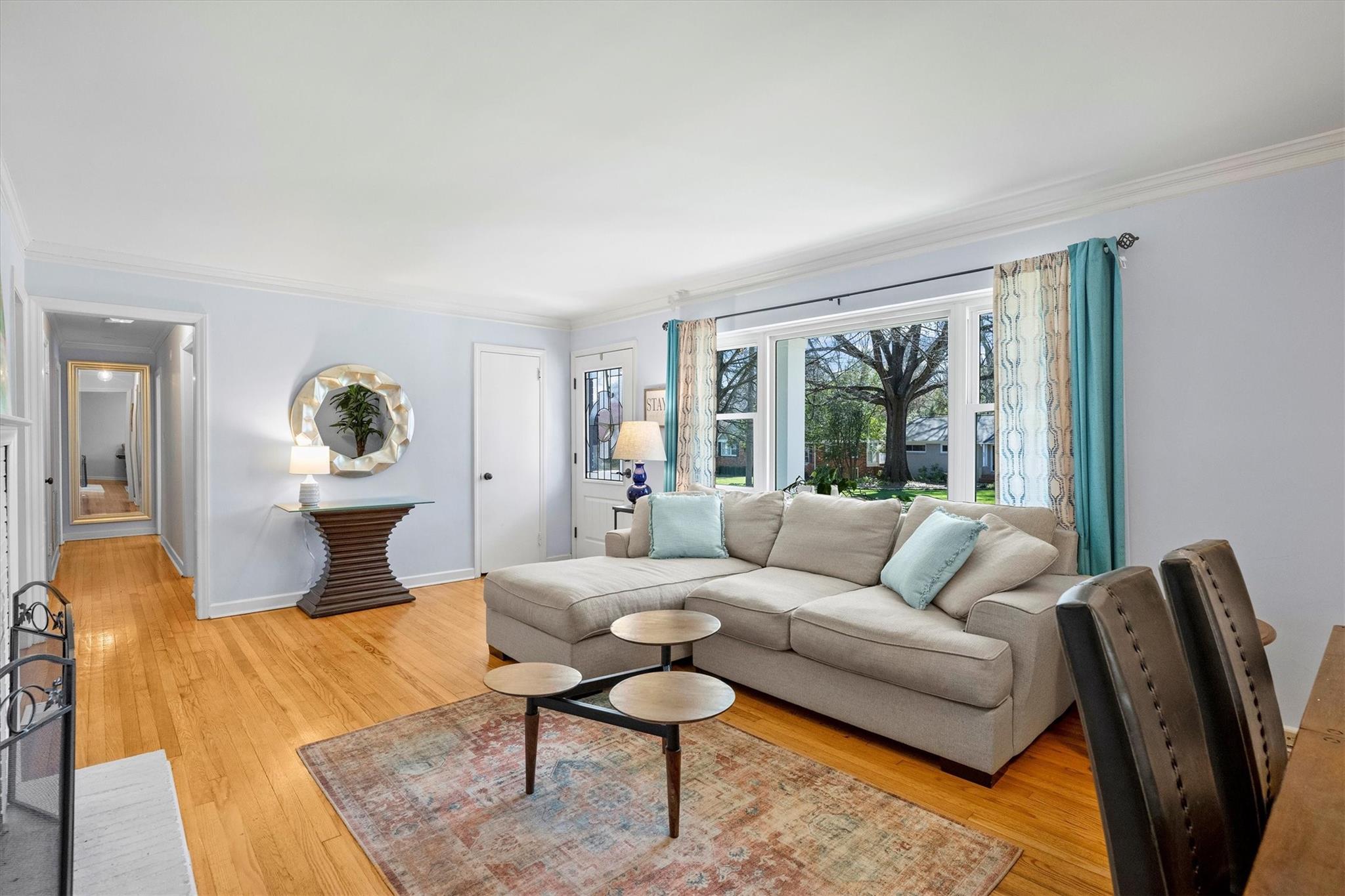 631 Seneca Place Charlotte, NC 28210 - Photo 4 of 21 a living room with furniture and a large window