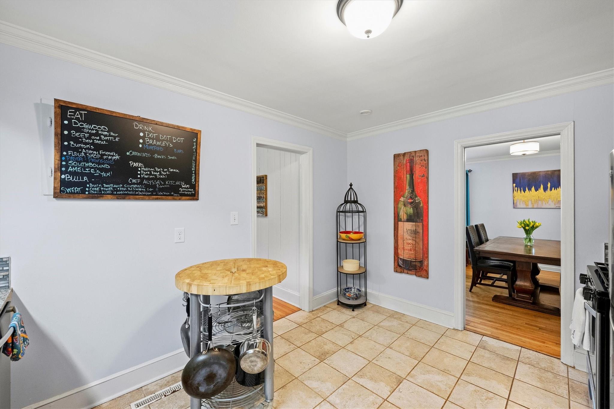 631 Seneca Place Charlotte, NC 28210 - Photo 8 of 21 a view of a livingroom with furniture and a fan