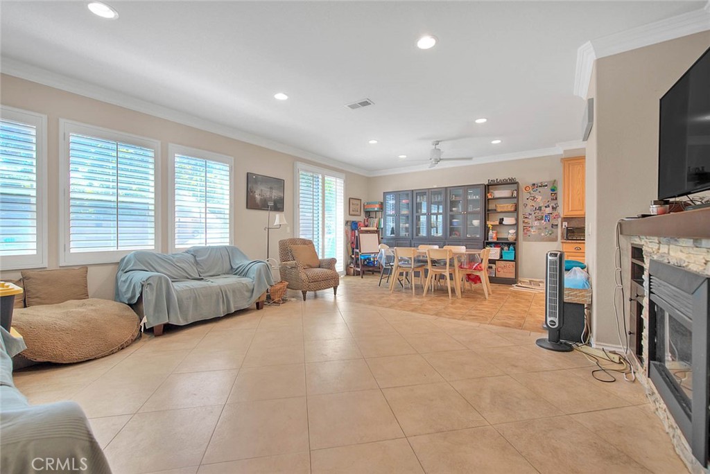 Undisclosed Address Upland, CA 91784 - Photo 11 of 38 a living room with furniture and a flat screen tv
