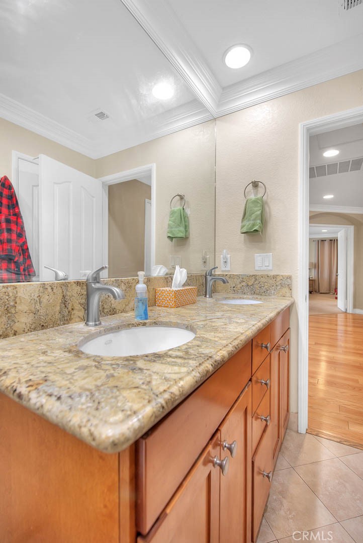 Undisclosed Address Upland, CA 91784 - Photo 23 of 38 a view of kitchen island a sink and living room