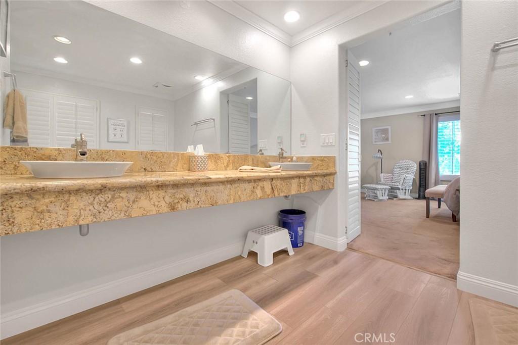 Undisclosed Address Upland, CA 91784 - Photo 30 of 38 a large kitchen with a lot of counter space and a sink