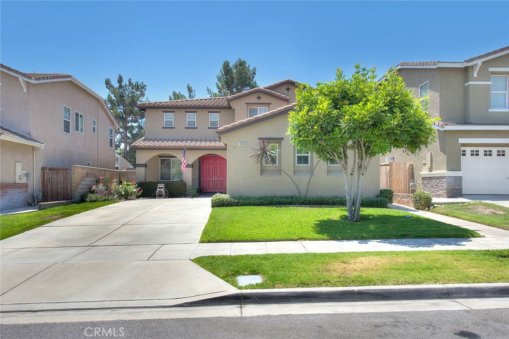 Undisclosed Address Upland, CA 91784 - Photo 37 of 38 a front view of house with yard and green space